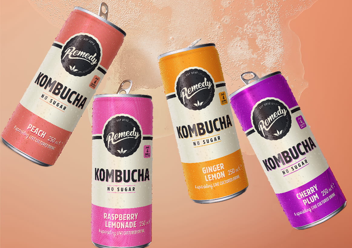 Remedy Kombucha Cans with Fizzy Kombucha Background