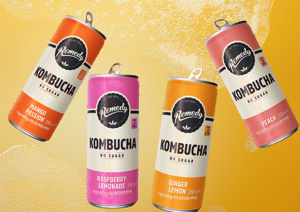 Remedy Kombucha Cans with Fizzy Kombucha Background