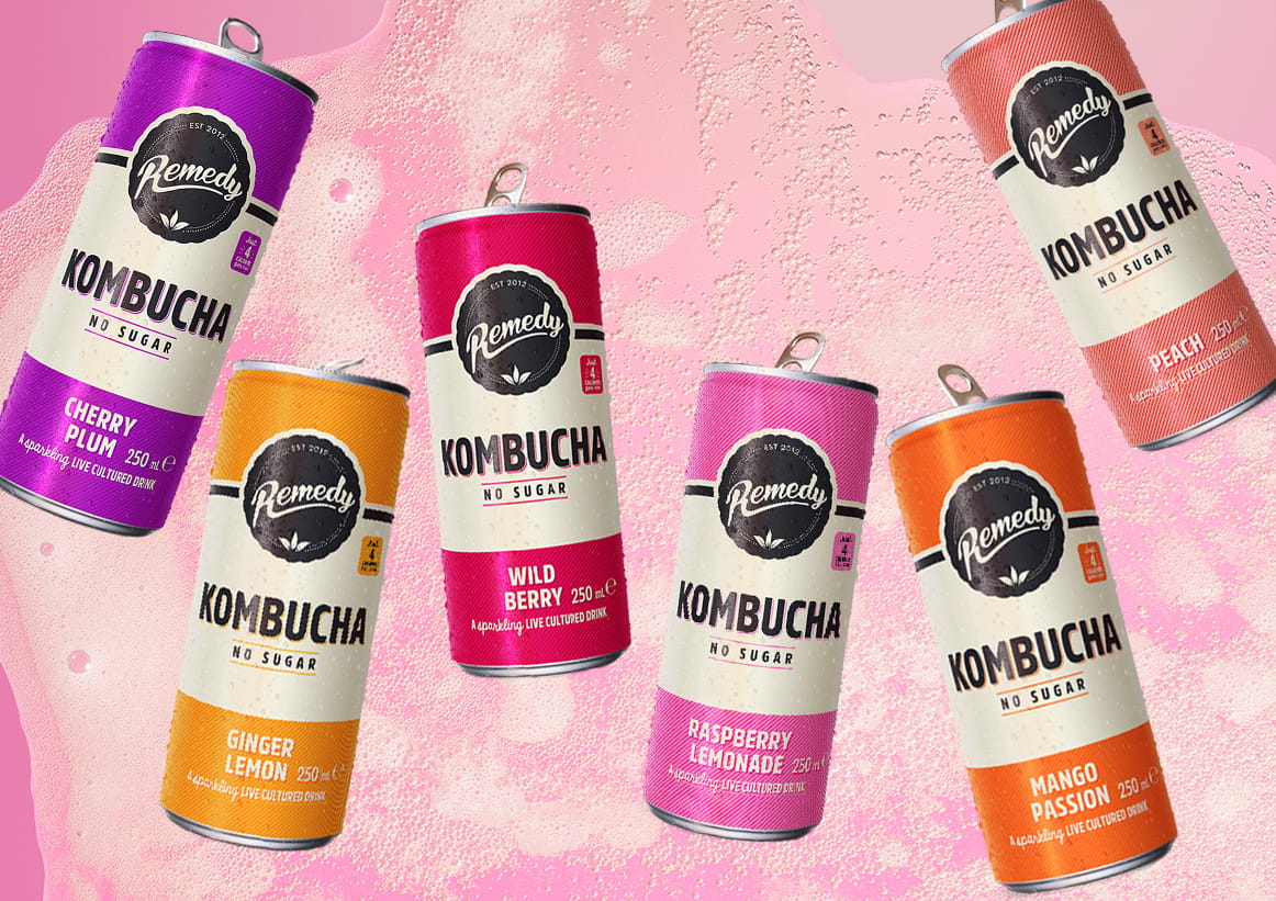 Remedy Kombucha Cans with Fizzy Kombucha Background